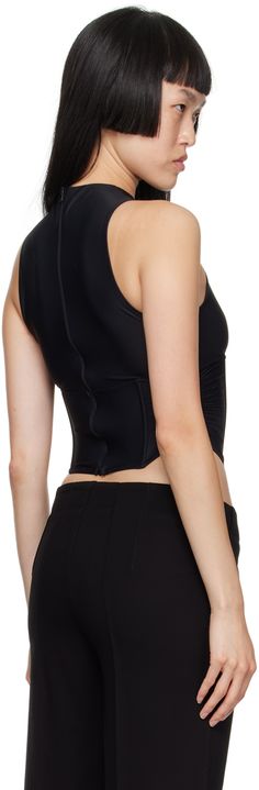 Semi-sheer stretch nylon jersey corset-style tank top. Boning throughout. · Round neck · Gathering at side seams · Zip closure at back Supplier color: Black Jersey Corset, Corset Style, Lifestyle Shop, Edgy Fashion, Scandinavian Style, Black Tank Tops, Urban Fashion, Womens Tank, Style Icons