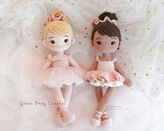 two crocheted ballerina dolls sitting next to each other