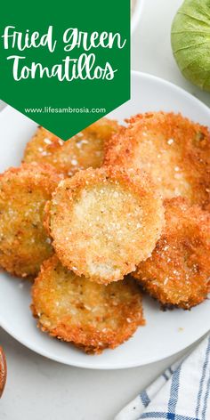 fried green tomatoes on a white plate with text overlay that reads fried green tomatoes