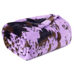 a purple and black animal print blanket on a white background