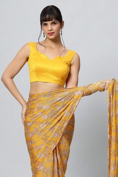 A classic look with a sweetheart neckline. Product Features: Color: Dark Yellow Fabric: Raw Silk with cotton lining Design Sweetheart Neckline with Tassels Closure: Back Not Padded Sizing: Not stretchable - margin of 2 inches inside seams for adjustments Occasion: Party, Wedding, Bridesmaid, Festive Product Type: Blouse Disclaimer: There will be slight difference in digital to actual image Festive Yellow Raw Silk Blouse, Yellow Unstitched Art Silk Blouse, Yellow Sleeveless Blouse With Pallu, Yellow Semi-stitched Silk Blouse Piece, Yellow Unstitched Raw Silk Blouse Piece, Bridesmaid Sarees, Raw Silk Blouse, Formal Saree, Yellow Saree