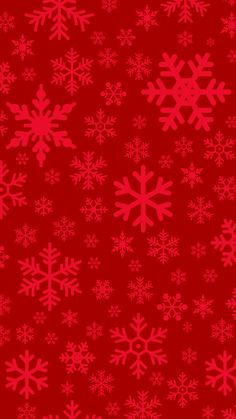 red and white snowflakes on a red background