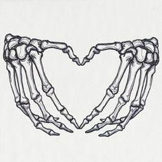 two hands in the shape of a heart with their fingers extended out to form a skeleton