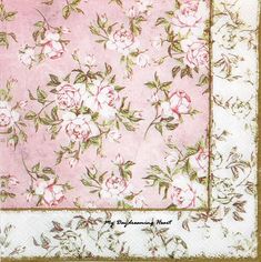 a pink and white flowered handkerchief with gold trimmings on it's edges