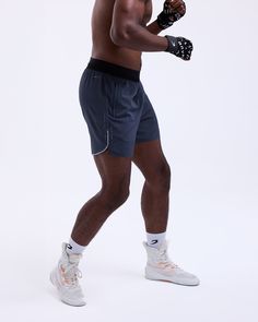 Developed alongside Bivol to keep you explosive and agile through intense training. Featuring split hems with reflective detailing for zero restriction when you need it most. Crafted from a SMRT-TEC fabric that wicks away moisture, ensuring you stay cool and dry, with zip pockets to secure all your training essentials. Finished with the subtle 'Mission: Seek & Destroy' statement running silently down your leg, a nod to Bivol’s quiet focus and inner drive. Bivol x BOXRAW branding Adjustable elast Dmitry Bivol, Lifestyle Club, East Street, Sauna Suit, Boxing Shorts, Fat Man, Heavy Bags, Split Hem, Wicks