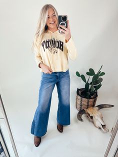 Loving this color of this shirt, It is crafted with 100% cotton, this Howdy Cowboy sweatshirt features a modest cropped body length and a boxy fit for a comfortable and stylish addition to your wardrobe. Cotton Cropped Sweater For Spring, Trendy Cotton Cropped Sweater For Spring, Cropped Cotton Sweatshirt With Graphic Print, Graphic Print Cropped Cotton Sweatshirt, Boxy Fit Cropped Sweater, Relaxed Fit Cotton Cropped Sweater For Spring, Casual Cropped Sweater Relaxed Fit, Casual Cropped Sweater With Relaxed Fit, Spring Cotton Cropped Sweater