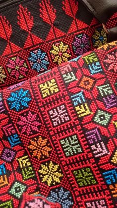 the seat covers are decorated with colorful designs