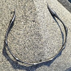 Forged Iron Serpent Torc | Dragon Tails Neck Ring | Torque Necklace Material: Hand forged iron, treated against rust. 120 gramsNeck Circumference* Sizes Available: 35cm (13.3") through 55cm (21.7") * The proper way to measure is the actual circumference of your neck. We will then size the length of the torc and the opening of the torc based on that circumference. Worldwide shipping available!Custom made per order. Please allow an additional week or two for delivery times. Dragon Tails, Torque Necklace, Dragon Tail, Neck Ring, Hand Forged Iron, Forged Iron, Hand Forged, Rust, Custom Made