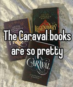 three books sitting on top of a bed with the words, the caraval books are so pretty