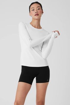 Alosoft Finesse Long Sleeve - White | Alo Yoga Alo Yoga Long Sleeve Top, Classic White Fitted Long Sleeve Top, White Stretch Alo Yoga Top, White Long Sleeve Alo Yoga Top, Alo Yoga White Stretch Top, Alo Yoga White Long Sleeve Tops, Fitted White Alo Yoga Top, Alo Yoga Long Sleeve Sporty Tops, Alo Yoga Long Sleeve Workout Tops