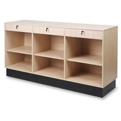 a wooden shelf with six compartments and two doors