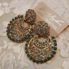 Nwt, Kenneth Jay Lane Couture Collection, Goldplated Earrings With Small Dark Green Cabochons And Small Turquoise Beads. Stunning Earrings. Has An Elegant Ethnic Look. Very Light. 2inches Turquoise Earrings For Evening, Elegant Turquoise Metal Chandelier Earrings, Turquoise Jewelry For Party, Blue Metal Earrings For Festive Occasions, Bohemian Earrings For Evening, Bohemian Clip-on Jewelry For Parties, Bohemian Evening Earrings, Blue Round Chandelier Earrings For Party, Bohemian Metal Earrings For Evening