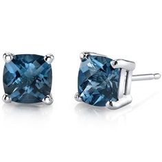 Our midnight muse You'll immediately fall in love with this mystical, midnight London Blue Topaz. These classic earrings feature cushion cut Peora natural london blue topaz gemstones in 14K white gold. Our natural London Blue Topaz gemstones are a unique gift from nature. By cutting them in a way that respects the rough's natural radiance, we ignite their inherent intensity and maximize their brilliance to deliver on our signature Peora standard. Handcrafted in pure 14K white gold goodness, these earrings have been carefully coated in an elegant rhodium finish. Our artisans are expertly trained in this process which fortifies the earring's strength, shine and brilliance. Shopping for birthdays, bridal parties or other occasions? Our concierge stylists are here to help with all of your jewe London Blue Topaz Earrings, Jewelry Questions, White Gold Earrings Studs, White Gold Studs, Gold Cushions, Blue Topaz Earrings, Solitaire Studs, Classic Earrings, Gemstone Stud Earrings