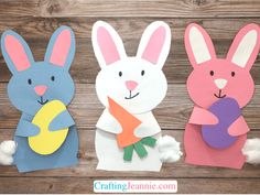 three bunny crafts made out of construction paper