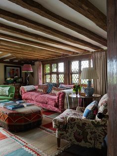 a living room filled with lots of furniture