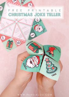 someone is holding up some christmas joke teller cards with the text free printable christmas joke teller