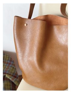 2024 New style. Simple leather bucket bag. Material: PU Leather Size: 11.8"H x 9.6"W x 6.2"D Designer Style ID: 8756 Chic Bucket Leather Bag with Shoulder Strap and Inner Pouch, Women's Everyday Handbag Everyday Handbag, Simple Leather, Chic Leather, Raffia Bag, Straw Bags, Leather Bucket Bag, Leather Bucket, Denim Bag, Designer Style