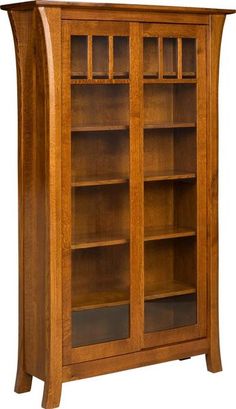 an oak bookcase with glass doors and shelves