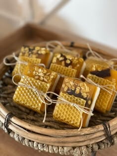 honey soaps tied with twine on a wicker basket