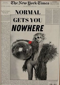 the new york times article features an image of a naked woman holding a disco ball