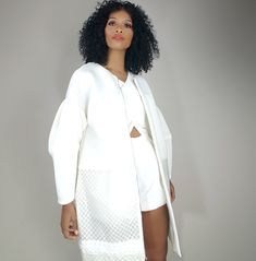 Cocoon Embrace (Off White) by Nik Spruill Clear vinyl and open net 3D air mesh, neoprene and polyester materials. Lantern bell sleeves Jacquard trim detail at edges and outlining of pockets Off White If preferred size is not in stock this item is made-to-order. Production generally takes an average of 18 business days (3.5 weeks). Please supply full measurements. bust, length, shoulder, sleeve in inches. Before purchase please be sure to email us at info@nikspruill.com so we can check and confir Couture Tops, Clear Vinyl, Romper Pants, Trim Detail, Shoulder Sleeve, Jumpsuit Dress, High Fashion, Bell Sleeves, Quality Fabric