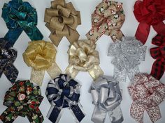 several different types of bows are shown in various colors and patterns on a white surface