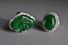 Fine statement ring set with jadeite jade and accented with diamonds in 18k. The jade is a deep green in and out of light, luminous even in its carved form. This luminous green is in fact imperial green jade, and specially 坑种 'keng zhong', a Mine Type jade whose texture is extremely fine grain. Both Old Mine (老坑) 'lao keng' and Mine Type (坑种) 'keng zhong' jadeite are treasured for their inimitable grain hence rarity. All Old Mine / Mine Type jade were mined from not recent periods, but it is not necessary for all of this old material to qualify as imperial green jade. Like diamonds, color and clarity (grain-translucency in the case of jade) will determine its imperial green grading. The jade on this ring is a ruyi, carved like a spade and rotated tall in a large ring. The imperial green gl Green Carved Rings For Formal Occasions, Formal Carved Green Ring, Formal Green Carved Ring, Luxury Green Intaglio Rings, Heirloom Green Jade Rings, Modern Jewelry Store, Imperial Jade Ring, Carved Green Jade Rings, Jade Rings With Polished Finish, Oval Cabochon