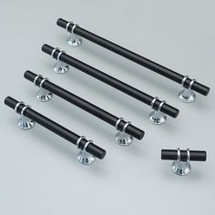 six black handlebars with chrome hardware on a gray background, set of four