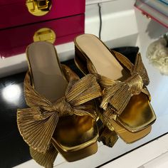 Never Worn Gold Slip On Sandals Luxury Gold Slip-on Sandals, Gold T-strap Sandals With Removable Insole, Gold Slip-on Sandals With Buckle Closure, Gold Sandals With 4-inch Heel In Synthetic Material, Gold Leather Adjustable T-strap Sandals, Gold Sandals, Slip On Sandal, Women's Shoes Sandals, Shoes Sandals