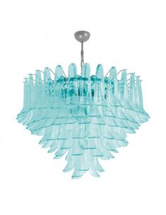 a blue chandelier hanging from the ceiling with clear glass petals on it's sides