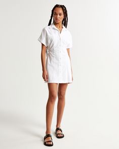 Elevate your wardrobe with the Abercrombie & Fitch Women's Short-Sleeve Poplin Shirt Dress, a blend of sophistication and comfort. This chic piece is designed for the modern woman, featuring:

- Size: XL Petite
- Color: Classic White
- Material: Cotton and Polyester blend
- Gender: Female

The dress showcases a classic collar and chest pockets, complemented by a fully functional button-through detail. The side ruching adds a flattering touch, making it perfect for both office wear and casual out Summer Cotton Button-up Shirt Dress, White Short Sleeve Shirt Dress For Work, Classic Summer Shirt Dress With Spread Collar, Classic Spread Collar Shirt Dress For Summer, Classic Shirt Dress With Spread Collar For Summer, Relaxed Fit Short Sleeve Shirt Dress With Placket, Day Out Short Sleeve Shirt Dress With Placket, White Short Sleeve Cotton Shirt Dress, Short Sleeve Relaxed Fit Shirt Dress With Button Closure