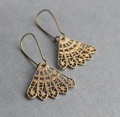 These intricate and beautiful earrings feature a bohemian filigree design in solid brass, which has an aged finish with touches of deep gold.  The beautiful, intricate detail reminds us of vintage lace. The earwires are solid brass, and these earrings are available in two length options.   ★ MEDIUM (3.5cm) fan hangs an inch below the earlobe ★ LONG (5cm) fan will hang at jawline level. This piece of handmade jewellery comes packaged in a nice recycled gift box with a handmade tag, all ready to g Bohemian Bridal Earrings With Intricate Design, Bohemian Pierced Chandelier Earrings For Wedding, Bohemian Drop Bridal Earrings Gift, Bohemian Bridal Drop Earrings Gift, Bohemian Bridal Drop Earrings, Bohemian Nickel-free Chandelier Earrings For Weddings, Golden Lace, Silk Purse, Fan Jewelry