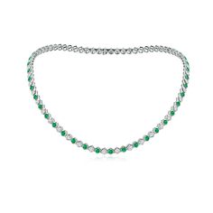 This elegant Natori necklace is designed in 14k white gold. The lush green emeralds and sparkling diamonds are alternately bezel-set in lustrous hexagonal frames, displaying an exquisite look.