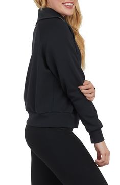 A modal-enhanced blend adds comfort to a half-zip sweatshirt styled with a stand collar and slightly split cuffs. 23" length (size Medium) Stand collar Long sleeves 47% modal, 46% polyester, 7% elastane Dry clean or machine wash, tumble dry Imported Versatile Funnel Neck Top With Ribbed Cuffs, Sporty Funnel Neck Top With Ribbed Cuffs, Sporty Long Sleeve Tops With Elastic Cuffs, Athleisure Tops With Elastic Cuffs For Fall, Sporty Top With Funnel Neck And Ribbed Cuffs, Sporty Tops With Funnel Neck And Ribbed Cuffs, Athleisure Turtleneck Sweatshirt For Loungewear, Athleisure Long Sleeve Tops With Ribbed Waistband, Sports Funnel Neck Top With Ribbed Cuffs