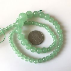 "6mm To 13mm Green Chrysoprase Color Jade Round Beads Green Jade Smooth Round Beads 18 Inch Strand Jade Necklace, Jade Jewelry GDS1793. Gemstone: Jade Size(mm): 6-13mm Length(inch): 18\", 65pcs Aprox Weight: 190gms Approx Color: Green (Color Treated) Item Code: GDS1793 (Weight, Measurements and number of pieces are approximate) You can get Authenticity Certificate at an extra cost of $15.00 We guarantee that the raw diamonds we offer are conflict-free--we only source socially responsible diamond Color Jade, Authenticity Certificate, Jade Necklace, Raw Diamond, Jade Jewelry, Green Jade, Heart Beads, Faceted Gemstones, Green Bead