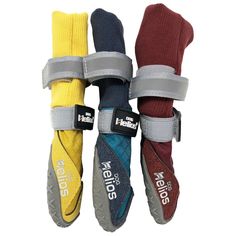 four pairs of socks with straps attached to them