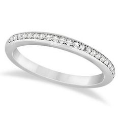 a white gold wedding ring with diamonds