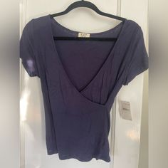 New With Tags Blue Cross Body Top Project Social T Size Medium Casual Purple Top For Everyday, Fitted Navy T-shirt For Spring, Casual Blue T-shirt For Day Out, Navy Everyday Spring Top, Blue Short Sleeve Tops For Day Out, Navy Top For Everyday Spring Wear, Navy Tops For Everyday Spring Wear, Navy Short Sleeve Tops For Day Out, Blue V-neck Top For Everyday