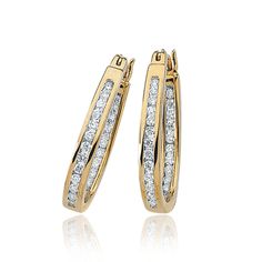 One of our favorites. These diamond hoop earrings are channel set with 50 - 1mm diamonds (1/2 total carat weight) and are crafted with 14 karat yellow gold. Luxe Jewelry, Gold G, Bow Jewelry, Square Earrings Studs, Knot Earrings, Leverback Earrings, Princess Diamond, Diamond Hoop Earrings, Channel Set