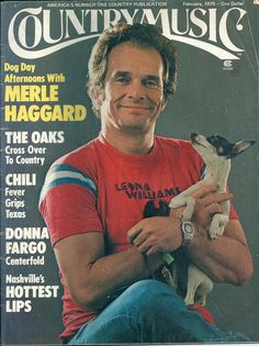 a man holding a dog on the cover of country music