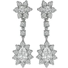 This beautiful pair of 14k white gold diamond earrings, center two stunning pear shape diamonds that weigh approximately 1.25ct. Accentuating these diamonds are high quality round cut diamonds weighing approximately 2.50ct. The diamonds are graded as G color with VS clarity. Inventory #72901PEBS Diamond Earrings Online, White Gold Diamond Earrings, Diamond Earring, Precious Jewels, Gold Diamond Earrings, Expensive Jewelry, Buying Diamonds, Diamond Gold, Pear Shaped Diamond