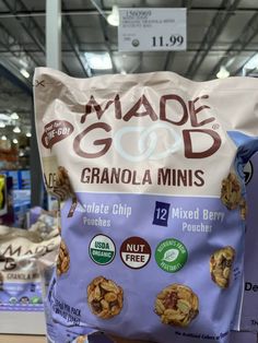 a bag of made good granola minis is shown in a store display case