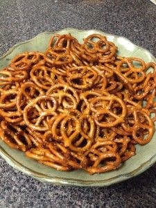 a plate full of pretzels sitting on a counter top, ready to be eaten