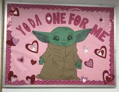 a star wars baby yoda one for me bulletin board with hearts on the wall