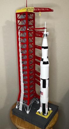 a model of a rocket on display in a room