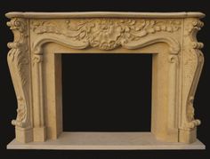 a white fireplace with carvings on the top and bottom part, sitting in front of a black background