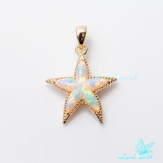 14k Gold Plated Gemstone Starfish Pendant, Gold Opal Starfish Charm Pendant, Hand Carved Starfish Pendant, Designer Gold Starfish Pendant 🌺Item Details🌺 Item Name : Starfish Pendant ( Only Pendant ) Metal : 925 Silver Size : 18MM Stone : Ethiopian Opal                                        🌊 *About Us: Natural World Jewelry* 🐚 At Natural World Jewelry, we're passionate about bringing the serene beauty of the ocean to your everyday life. Our artisanal jewelry pieces are lovingly handcrafted using a diverse array of exquisite shells collected from the world's most breathtaking shorelines. 🐚 *Our Craftsmanship* Each piece of jewelry in our collection is a testament to the unique beauty found in nature. Our skilled artisans carefully select, shape, and polish each shell to create one-of- Ocean-inspired Star Charm Jewelry, White Star-shaped Ocean-inspired Jewelry, Ocean-inspired White Star-shaped Jewelry, Ocean-inspired White Star Jewelry, White Star-shaped Jewelry With Starfish Charm, Starfish Pendant, Quartz Pendant, Opal Pendants, Gold Design