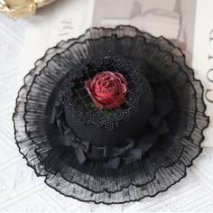 This price is for a mini hat only.   	 		 			Size 			Free Size 		 		 			Diameter 			18 Black Hats For Spring Gifts, Black Hat For Spring Gift, Black Hats As Spring Gifts, Black Hat For Kentucky Derby Gift, Black Hat For Kentucky Derby, Mini Hat, Rose Design, Free Size, Black White