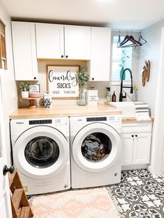 a washer and dryer in a small room