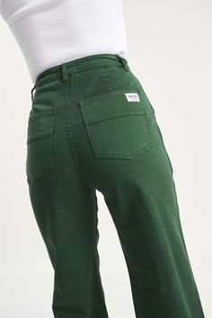 Buy Heidi Jean - Trade Basil Online | Rollas Jeans Relaxed Fit Green Cargo Jeans With Hip Pockets, Green Wide Leg Cargo Jeans For Workwear, Green Cotton Bottoms With Five Pockets, Green High Rise Relaxed Fit Jeans, Trendy High Waist Green Flare Jeans, High Rise Green Cotton Jeans, Green Relaxed Fit Tapered Leg Jeans, Green Mid-rise Relaxed Fit Jeans, Green High Rise Cotton Jeans